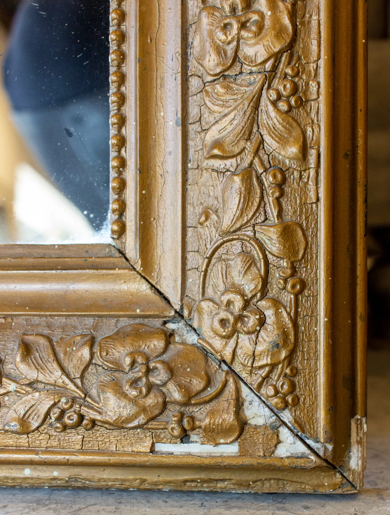 Antique French Distressed Gilt Finish Louis Philippe Mirror with Floral Details