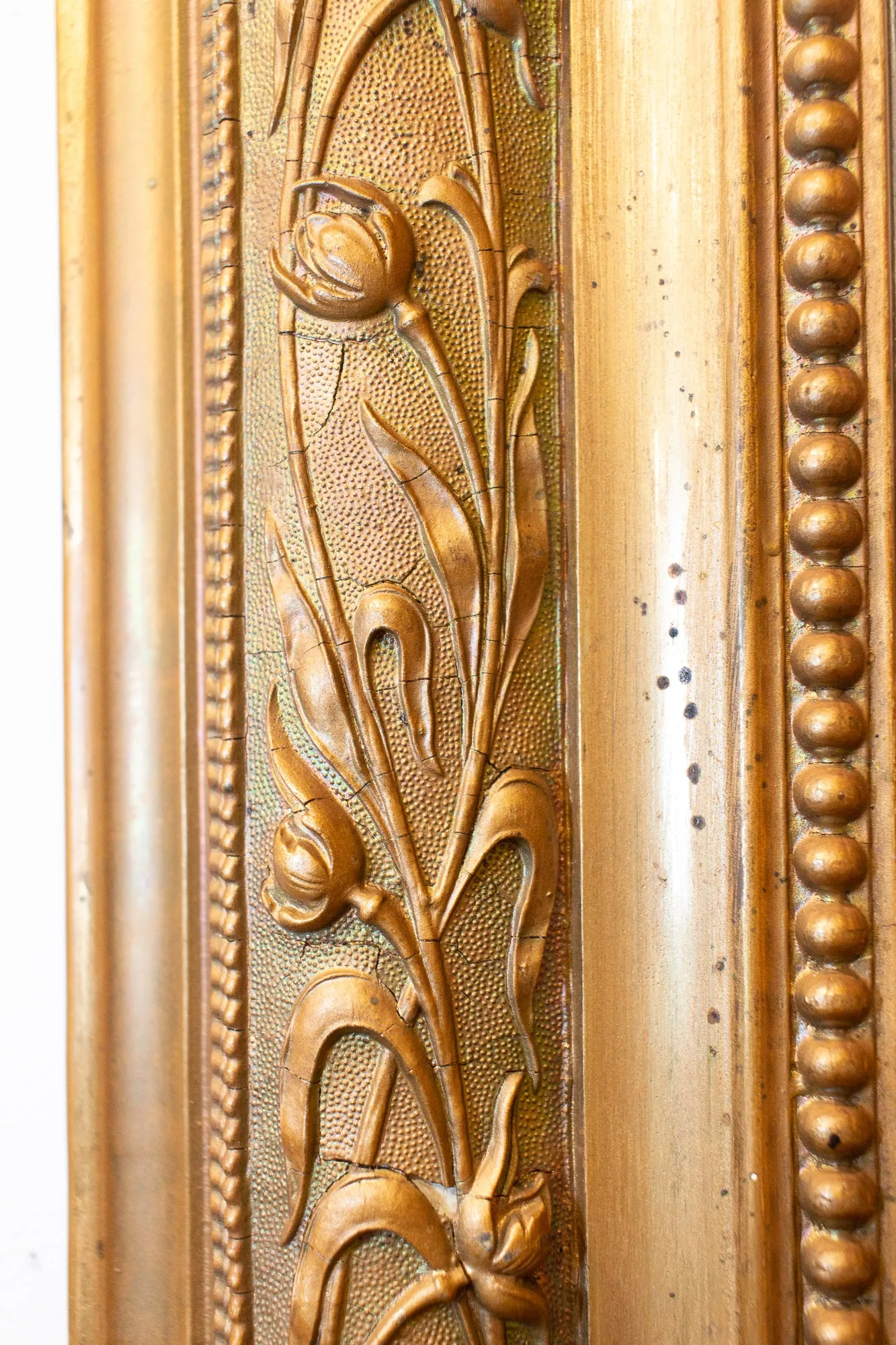 Antique French Louis Philippe Gilt Mirror with Detailed Floral Frame