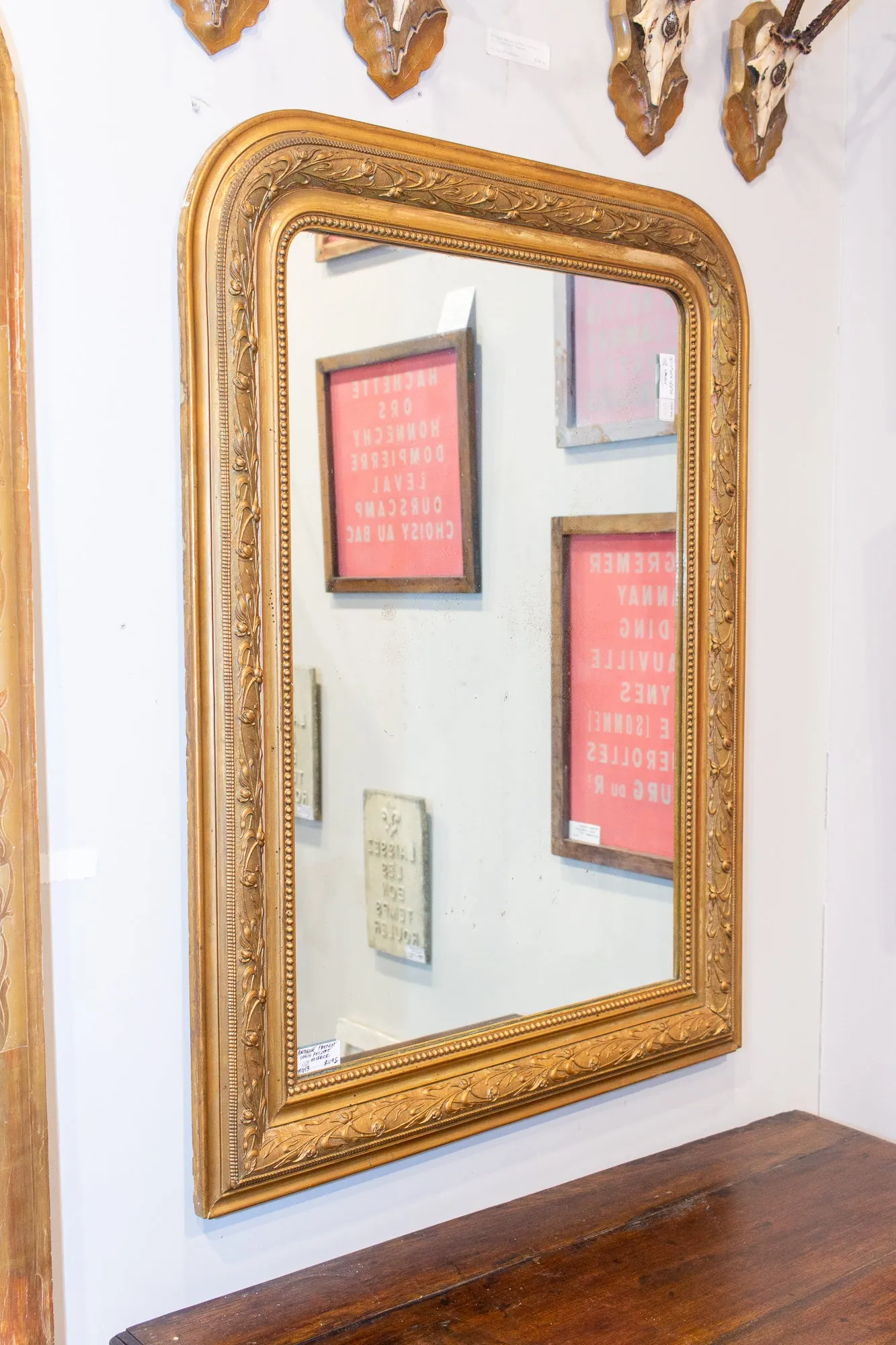Antique French Louis Philippe Gilt Mirror with Detailed Floral Frame