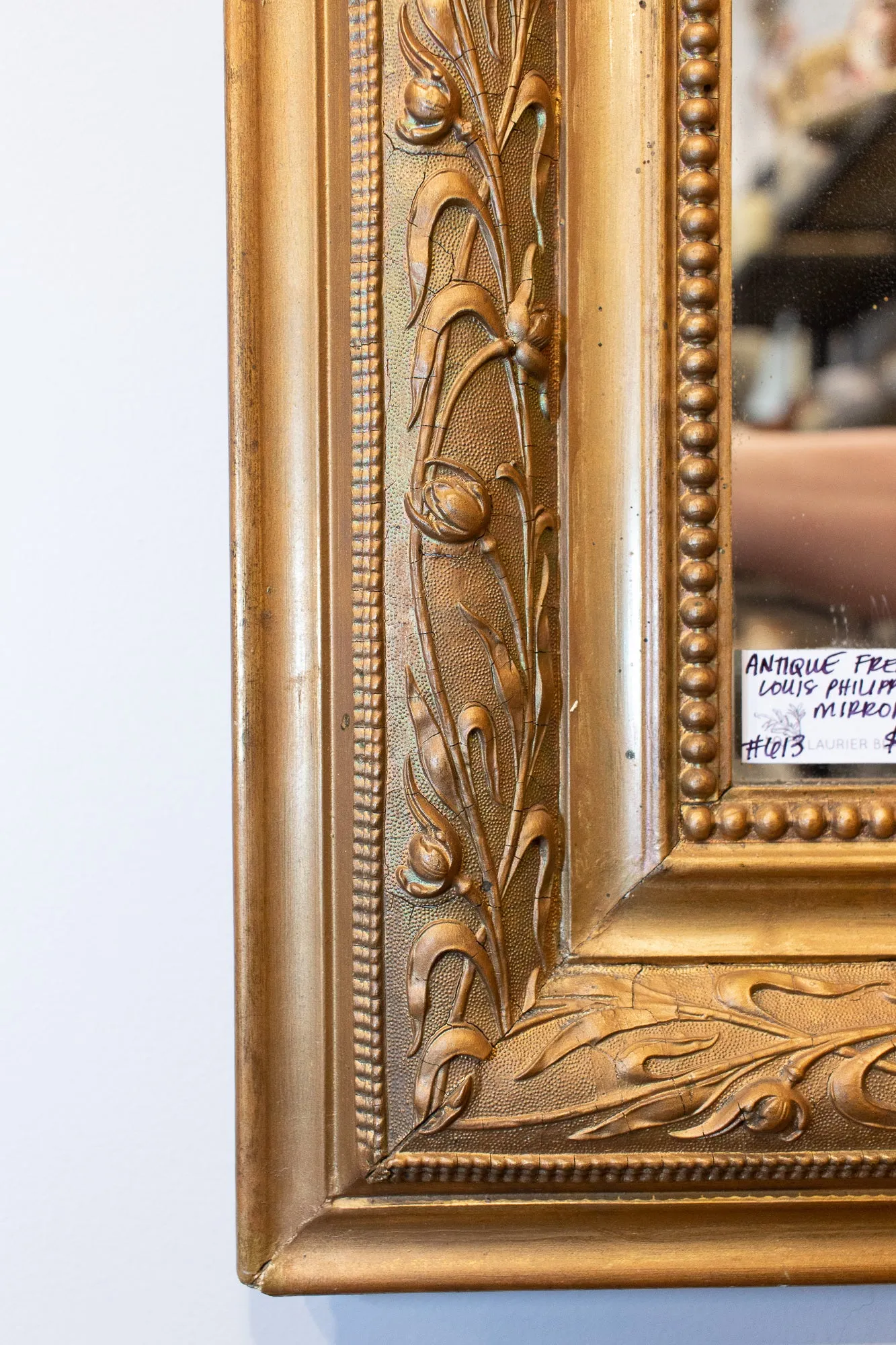 Antique French Louis Philippe Gilt Mirror with Detailed Floral Frame