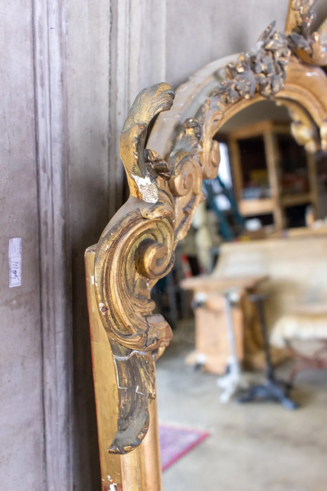 Antique Gilt Full-Length Mirror with Decorative Carvings and Shell Cartouche