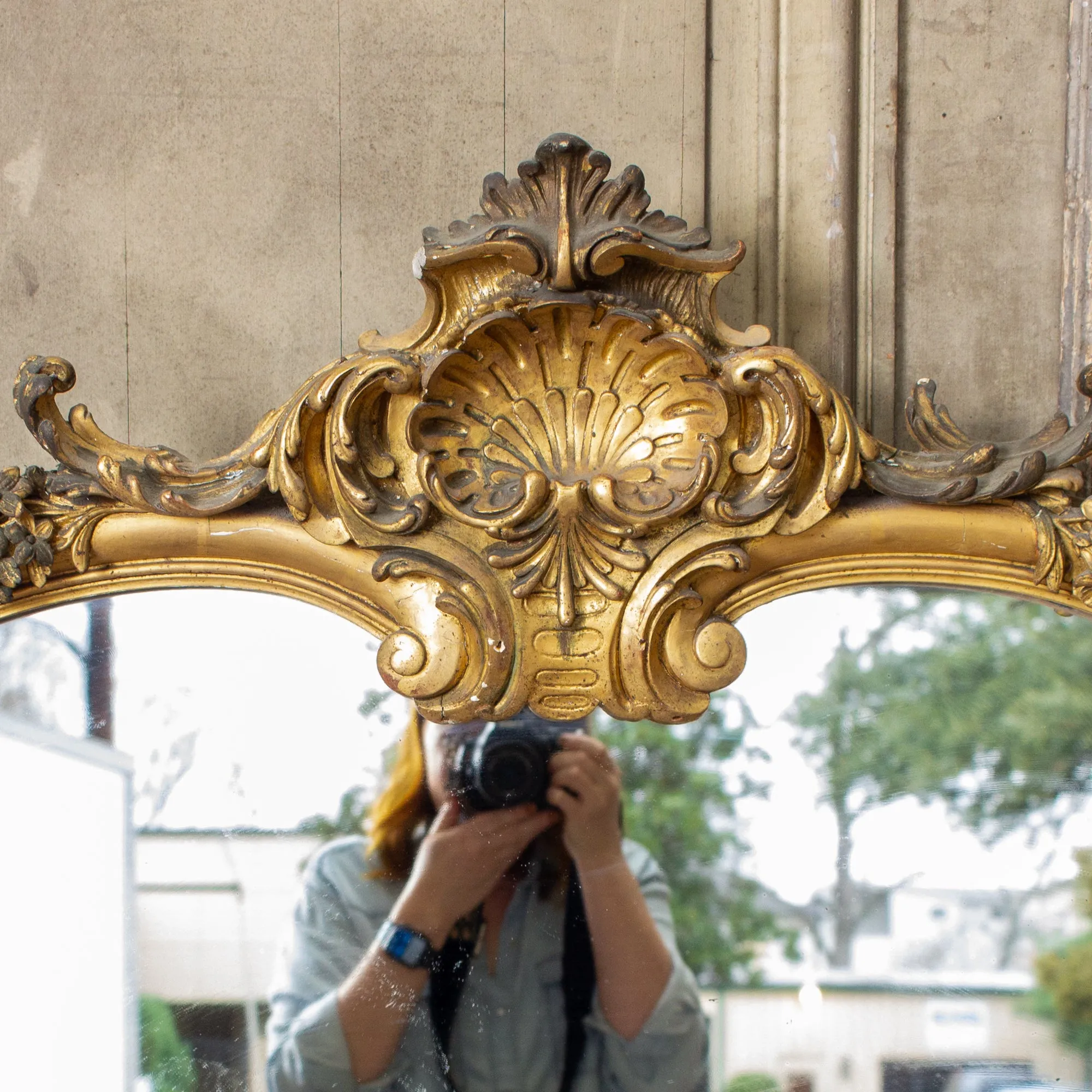 Antique Gilt Full-Length Mirror with Decorative Carvings and Shell Cartouche