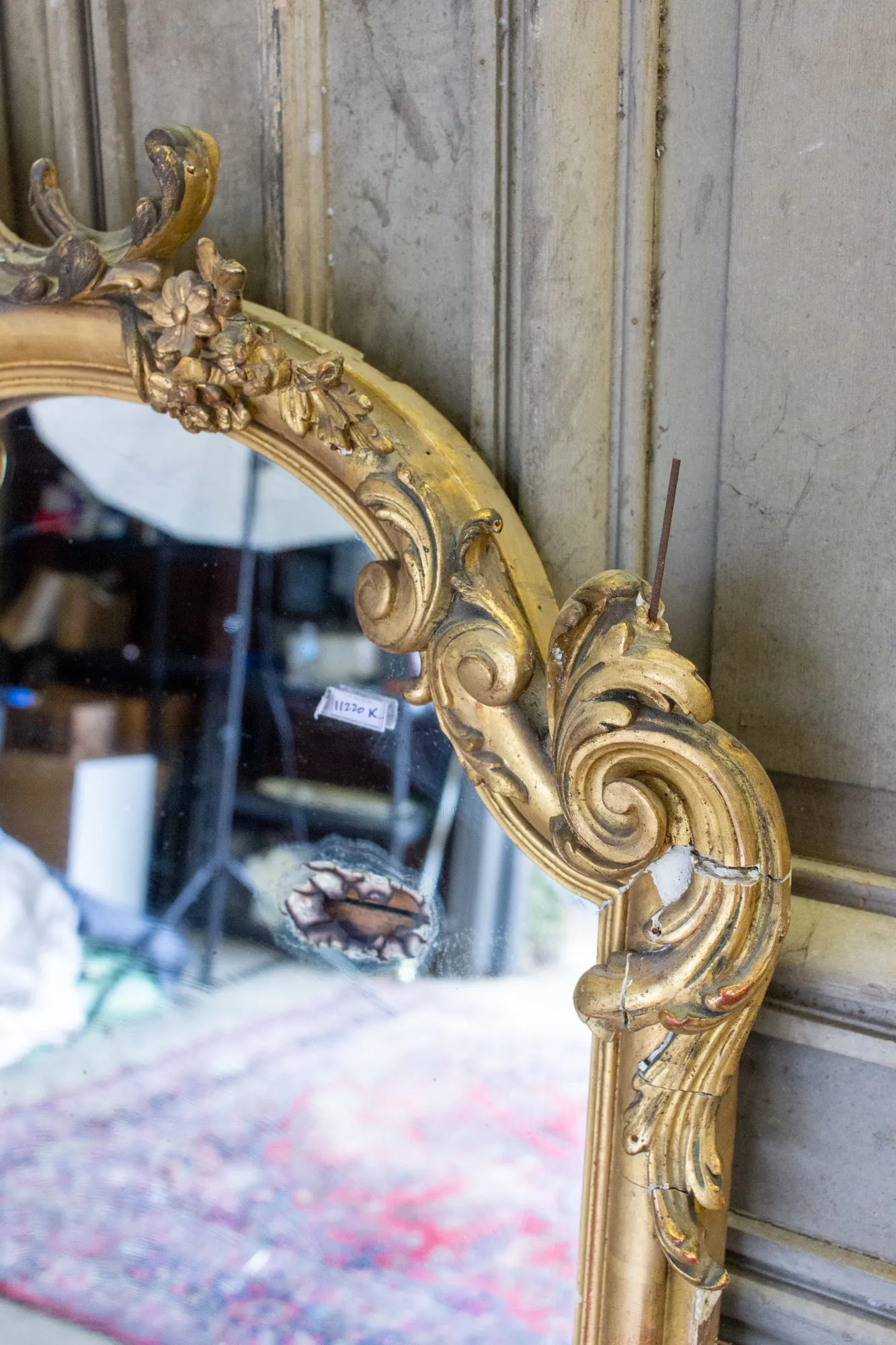 Antique Gilt Full-Length Mirror with Decorative Carvings and Shell Cartouche