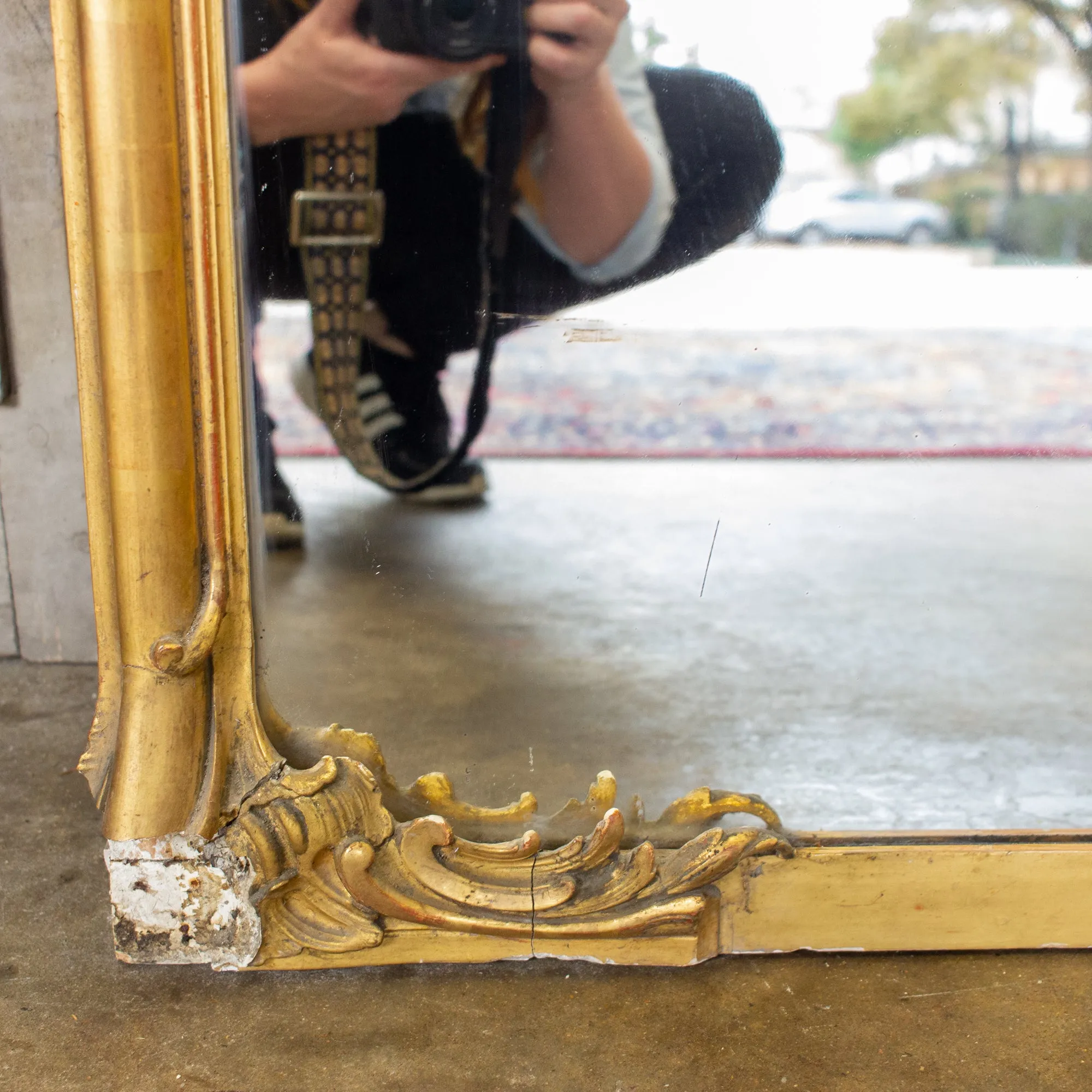Antique Gilt Full-Length Mirror with Decorative Carvings and Shell Cartouche