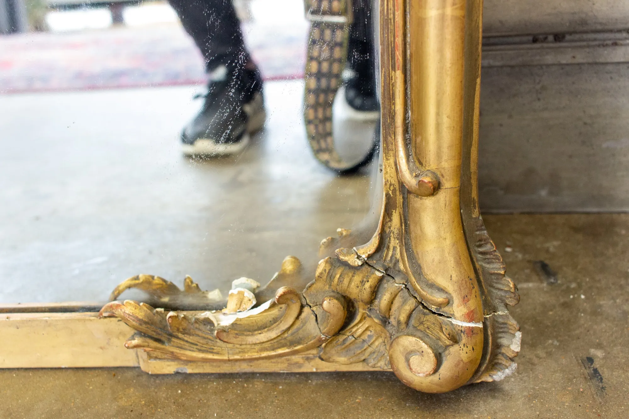 Antique Gilt Full-Length Mirror with Decorative Carvings and Shell Cartouche