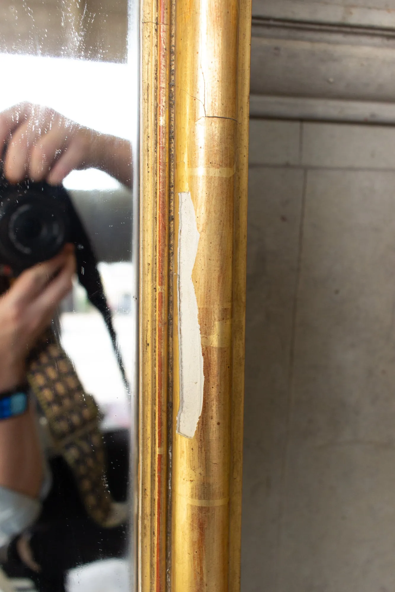 Antique Gilt Full-Length Mirror with Decorative Carvings and Shell Cartouche