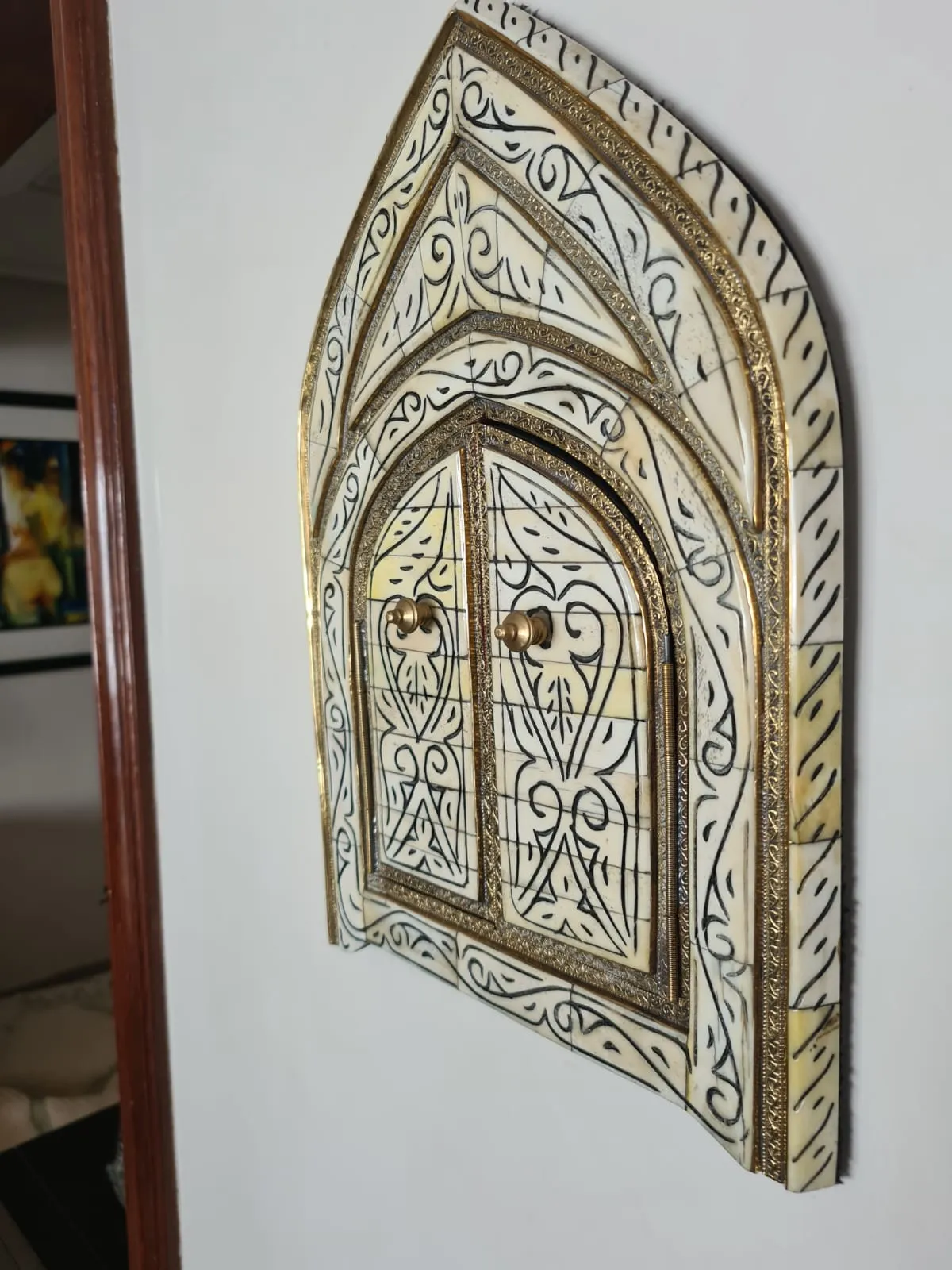 Exquisite brass and bone mirror