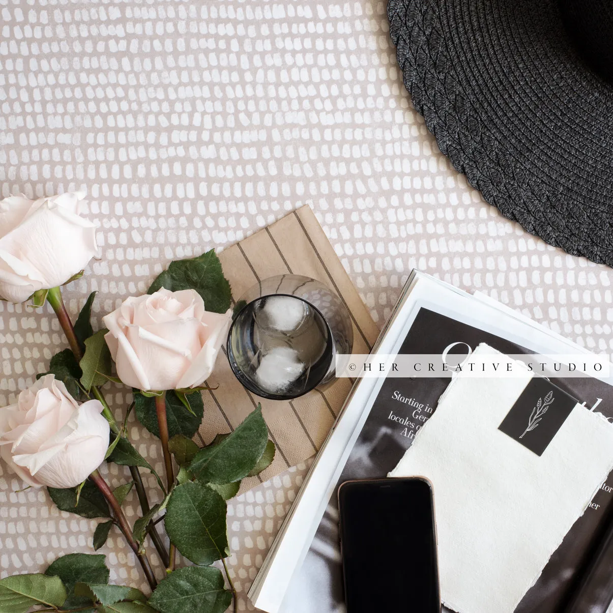 Roses & Note Paper on Patterned Tablecloth, Stock Image